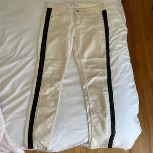 White skinny jeans with faux leather side panel